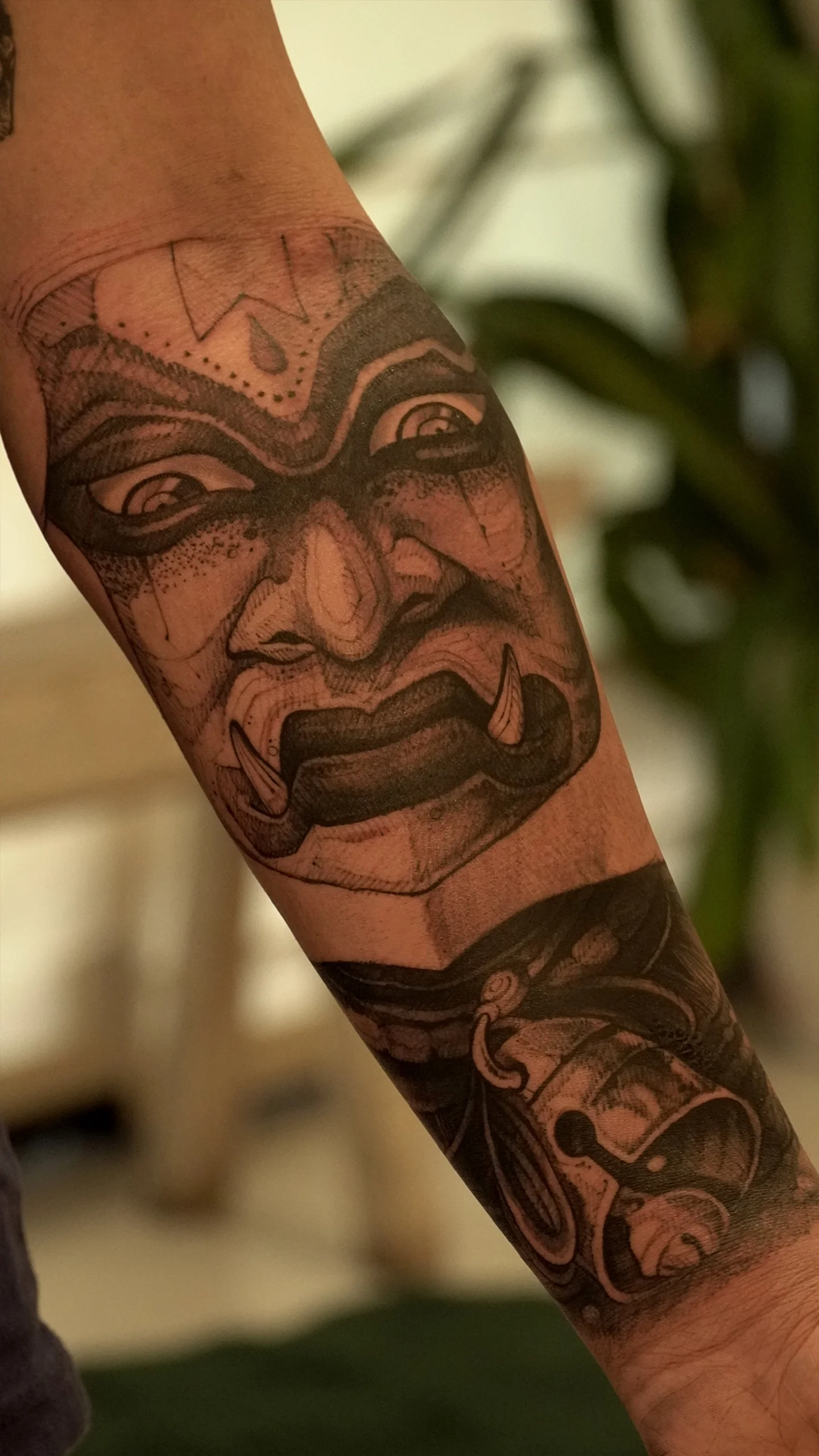 Fine line black and grey portrait tattoo with controlled contrast by Eric Edward